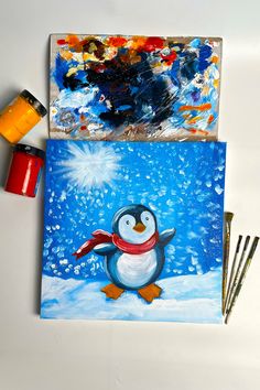 A festive Christmas painting on canvas featuring a cheerful penguin with a red scarf against a snowy background. Paint Night, Lighted Canvas