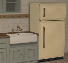 a white sink sitting next to a refrigerator freezer in a kitchen on top of a hard wood floor