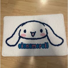 a white towel with a blue bunny on it