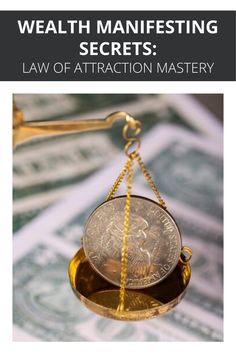 a scale with money on it and the words,'law of attraction mystery '