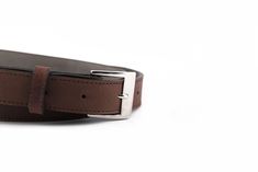 "Handmade leather belt. Leather lining and metal buckle. Belt thickness of 3/4\". We suggest ordering two sizes above your pant size. For example: If you are a size 30, we suggest the belt size 32. *Can be manufactured in other colors. Please contact us for a custom quote. **The details and color in this piece may slightly vary to the ones shown, they are a result of the nature of the manufacturing process." Brown Belt Buckles For Workwear, Slimmer Belt, Handmade Leather Belt, Belt Brown, Belt Leather, Buckle Belt, Manufacturing Process, Black Backpack, Designer Wear