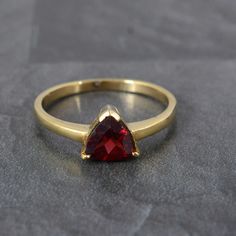 Red Garnet Gold Ring, Minimalist Ring, 925 Silver/Rose Gold Ring, Garnet Ring, Engagement Ring, Red Garnet Jewelry, Gold Gift For Her Welcome to My shop We provide the Excellent quality Jewelry to our Customers. Customer satisfaction is our first priority . Vintage brass ring with beautiful design. Handmade Items Product:- Ring Material:- Brass, 925 Sterling Silver Gemstone:- Garnet We have 925 Sterling silver rings in all size for both men and women. We always use precious and semi precious gemstone for making jewelry. If you have any design in your mind so please let us know we will try our best to made it( For customization Making charges will apply). we give fast delivery service. If you have any questions or problem please contact us :- (naruto100798@gmail.com) Thank you. Garnet Ring Engagement, Garnet Gold Ring, Red Garnet Jewelry, Gold Finger Rings, Handmade Gold Ring, Red Garnet Ring, Ring Rosegold, Garnet And Gold, Women's Rings