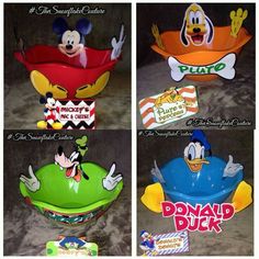 four different mickey mouse bowls with the same character on them and one has a donald duck logo