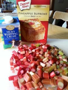 there are many different types of food on the table, including bread and watermelon cubes