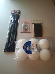 several white balls and other items on a table