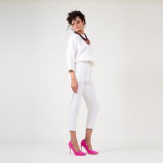 White set with oversized blouse with an elastic waistband and cropped slim fit trousers. Dry clean only. Spring Straight Pantsuit For Office, Chic Cropped Bottoms For Daywear, Elegant Cropped Pants For Work, Spring Workwear Pantsuit With Ankle-length Pants, Spring Workwear Ankle-length Pantsuit, Spring Workwear Pantsuit With Tapered Leg, White Pants For Office Wear In Spring, Spring White Pants For Office Wear, White Pants For Spring Office Wear