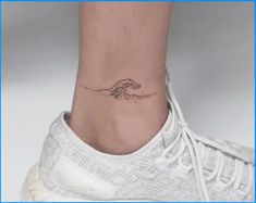 a woman's foot with a small wave tattoo on the side of her ankle