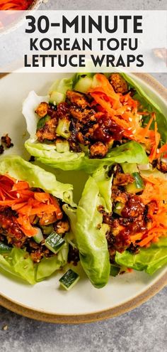 three lettuce wraps on a plate with carrots