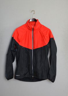 Vintage 90s Nike Tracksuit Nike Red Black Windbreaker Zip up Jacket Bomber Jacket Sportwear Jacket Nike Vest Medium size Tag brand: NIKE Label size: M Measurements(taken laying flat): Chest: 55 cm/21.4" Length: 77 cm/ 30.4" Sleeve from neck line: 80 cm/31.4" Material: 100% polyester Lining: 100% polyester Great vintage condition. SHIPPING * I ship worldwide via Priority mail (Latvijas Pasts) from Latvia (EU). * I ship from Europe, so please allow 2 to 4 weeks for the package to arrive if you liv Red Nylon Track Jacket For Outdoor Activities, Functional Red Long Sleeve Windbreaker, Red Functional Long Sleeve Windbreaker, Red Long Sleeve Functional Windbreaker, Red Long Sleeve Nylon Windbreaker, Nike Vest, Nike Tracksuit, Jacket Nike, Black Windbreaker