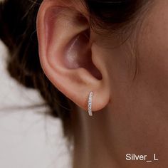 Pave Huggie Hoop Earrings in Sterling Silver,Diamond Hoop Earrings,Crystal Earrings, Minimalist Jeewelry,Everyday Gift For Her  (EC1976) ▶Product Info. - Material: 925 Sterling Silver /  Cubic Zirconia - Metal Finish: 14K Gold / Silver + Anti-Tarnish E-Coat  - Safety: Nickle & Lead free and Hypoallergenic - Dimensions:  Small - Inner Diameter - 6.2mm / Outer Diameter - 9mm / Width - 1.6mm  Medium - Inner Diameter - 7mm / Outer Diameter - 10mm / Width - 1.6mm  Large - Inner Diameter - 9mm / Outer Diameter - 12mm / Width - 1.6mm - Weight: S-0.9g / M-1.0g / L-1.28g - Made In South Korea - If hoop doesn't work well, please gently press down or up the end of the silver post when you wear the earrings. Our jewelry was plated with a high-content gold/silver layer to minimize the discoloration, co Small Hoop Earrings Silver, Small Diamond Hoop Earrings, Hoop Diamond Earrings, Silver Huggie Earrings, Earrings Crystal, Diamond Hoop Earrings, Earrings Minimalist, Everyday Gifts, Huggie Hoop Earrings