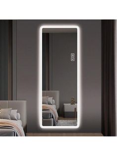 an illuminated mirror in the middle of a room with a bed and night stand next to it