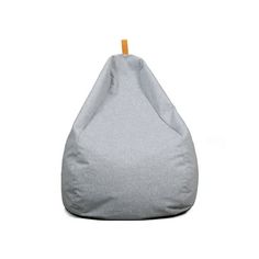 a small grey bean bag sitting on top of a white floor next to a wooden stick