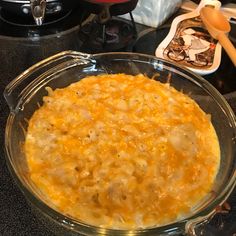 a casserole dish is sitting on the kitchen counter ready to be cooked and eaten