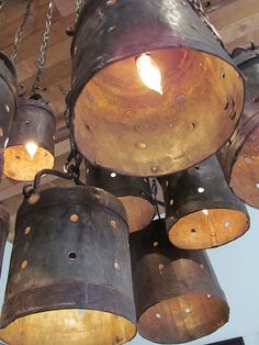 an old fashioned chandelier hanging from the ceiling