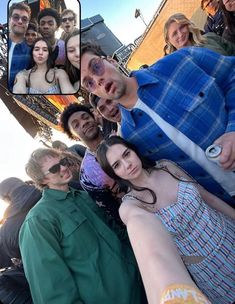 a group of people are taking a selfie