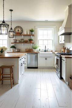 Farmhouse-style kitchen with whitewashed laminate floors and shiplap walls Farmhouse Tile Kitchen Floor, White Laminate Flooring Kitchen, Kitchen White Tile Floor, Laminate Kitchen Floor, Farmhouse Kitchen Tile Floor, Affordable Flooring Ideas, Kitchen Flooring Ideas Vinyl, Laminate Kitchen Flooring, Kitchen Floor Ideas