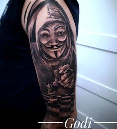 a guy with a creepy mask on his arm