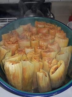 some food is cooking in a bowl on the stove top and it's ready to be eaten