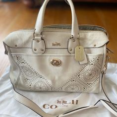 Coach Winter White Bag With Gold And Silver Rivets Coach White Leather Bag, Coach Dempsey Tote 22 White, Red Satchel, Soft Leather Handbags, Coach Satchel, Silver Bags, Black Satchel, Bags Coach, Leather Satchel Bag