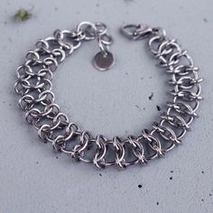 Handmade unisex stainless steel chainmaille bracelet. Every single ring is linked to other rings manually! It is a beautiful artisan creation all made by hand. Standard length is 20 cm for a wrist with a circumference of approximately 15.5-17.5 cm. But it can be customized easily to fit other wrist sizes. Kindly send me a message when placing your order. Stainless steel is very durable and well tolerated by the skin of many people. It does not stain or tarnish. It's also a great gift for a speci Best Friend Soulmate, Friend Soulmate, Chainmaille Ring, Chainmail Patterns, Chainmaille Tutorial, Chainmail Jewelry, Nickel Allergy, Chainmaille Bracelet, Single Ring