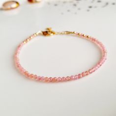 "Minimalist, wearable and delicate 14k gold filled and rhodochrosite beads bracelet. Length: from 5,5\" to 8\" with 1\" 14k gold filled extensor chain. Width: 2mm faceted rhodochrosite beads and 14k gold filled beads. Material: 14k gold filled strong lobster clasp. Handmade in Spain. ✩ Please kindly note that these stones are natural so they can vary slightly in color from the one on the pics. They can also contain some inclusions. ✩ Ideal for a gift and for combinate with other bracelets. All o Bracelet Miyuki, Miyuki Bracelet, Bracelet Heart, Gold Armband, Crystal Healing Bracelets, Simple Bracelets, Rose Jewelry, Chakra Bracelet, Moonstone Jewelry