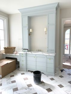 an empty kitchen is being remodeled with new cabinets