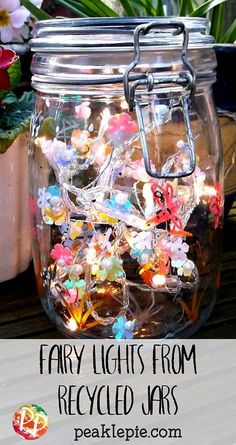 fairy lights in a jar with text overlay that reads fairy lights from recycled jars