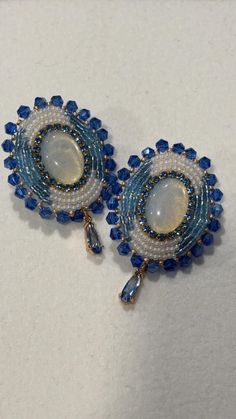 pair of blue and white beaded earrings