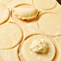 the dough is ready to be baked and put into pie tins with butter on top