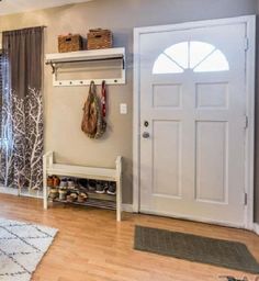 the entryway is clean and ready for us to use as a storage area in this home