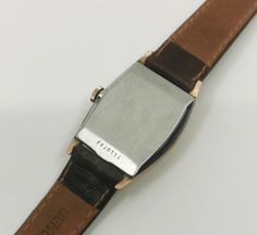 Rare 1940s original BULOVA CURVEX TANK with brand new brown saddle leather strap and with a very well preserved Curvex glass, with sought-after, salmon-colored original dial with black, Arabic indexes and original, blued steel pointers. Original legendary BULOVA caliber 10BC with 15 jewels, watch runs perfectly for it's age. Worth collecting, original timeless classic in good condition! Classic Brown Watch Accessories With Rectangular Dial, Classic Brown Watch Accessories For Formal Occasions, Vintage Formal Watch With Leather Strap, Vintage Leather Watch Accessories For Business, Vintage Watches With Leather Strap And Rectangular Dial, Vintage Watch With Leather Strap And Rectangular Dial, Vintage Rectangular Watch With Leather Strap, Retro Brown Watch Accessories For Formal Occasion, Brown Retro Formal Watch