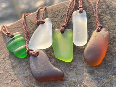 Sea glass necklaces. Reclaimed from the ocean, drilled and made into something new and beautiful. An eco friendly gift for yourself or a loved one.  I have hung them on sustainable hemp. The cord has been left loose so you can tie at your preferred length.  The pendant will arrive in a smart recycled gift box.  If purchasing as a present, recycled handmade cards are also available in my shop. I would be happy to add a message of your choice if you wish me to post direct.  Lynda - EcoOctopus 💚 h Unique Recycled Glass Necklaces For Beach, Unique Recycled Glass Beach Necklace, Minimalist Handmade Necklaces With Recycled Glass, Minimalist Handmade Necklace With Recycled Glass, Handmade Bohemian Sea Glass Necklaces, Handmade Bohemian Sea Glass Necklace, Unique Handmade Sea Glass Necklaces, Handmade Unique Necklace With Sea Glass, Recycled Necklace