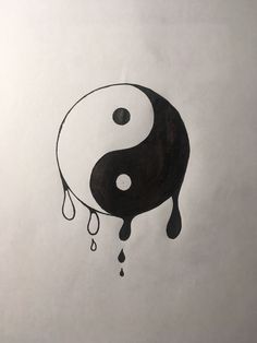 a black and white drawing of a yin - yang symbol with drops of water dripping from it