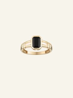 The Solid Gold Black Onyx Ring features an onyx rectangle stone with a band. Item Details: Available in 9k or 14k Solid Gold 7x5mm rectangle onyx stone 1.7mm band width Available in five sizes Hollow inside band Made to order PLEASE NOTE: Our current timeframe for handcrafting this Solid Gold ring is 3-5 weeks before dispatch. Please email us at contact@loveisabelle.com for specific timeframe enquiries. Classic Onyx Rectangular Signet Ring, Classic Black Rectangular Ring, 14k Gold Rings With Rectangular Stone In Timeless Style, Classic 14k Gold Ring With Rectangular Stone, Elegant Onyx Rectangular Signet Ring, Rectangular Onyx Gemstone Rings, Rectangle Stone Ring, Rectangle Ring, Peridot Stone