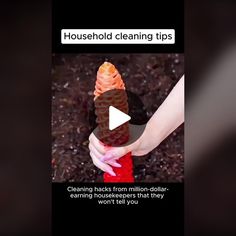 a person holding an ice cream cone with the caption household cleaning tips on it