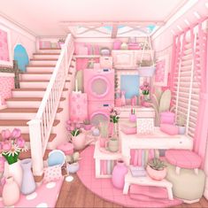 a room filled with lots of pink furniture and decor