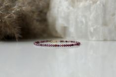 "This beautiful gemstone bracelet is made with high quality (AAA) natural Ruby crystals. Ruby is the crystal for a 40th wedding anniversary or people with a July birthday. This delicate Ruby bracelet is perfect for itself or is simple enough that it can be layered with other bracelets. This is the perfect gift for any occasion or just gift for yourself - we worth it;) . ❗️Sign up to our Newsletter and get 15% OFF your order (copy this link to browser search) - https://forms.gle/R74xLdL1MSmC9Apn6 40th Wedding Anniversary Gifts, 40th Wedding Anniversary, Ruby Bracelet, Jade Crystal, Ruby Crystal, Ruby Beads, Tourmaline Bracelet, Garnet Bracelet, Birthstone Bracelet