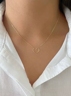 "Minimalist Dainty 14K Yellow Gold Open Heart Charm Necklace. Necklace Is Adjustable From 18\" To 16\" Inch. Perfect For Everyday Wear. Treat Yourself Or Someone Special To This Beautiful Necklace. Perfect For Layering. Chain Is A High Quality Box Chain That Feels Like Silk. Jewelry Comes In A Cute Jewelry Box Ready To Present. Model Is Wearing A 16\" Inch Chain. -All Jewelry Is New And Inspected For Quality Assurance. -jewelry Is Crafted In Genuine High Quality 14K Gold. -We Do Not Sell Gold Pl Elegant 14k Gold Filled Heart Necklace, Minimalist 14k Gold Jewelry For Valentine's Day, Minimalist Heart Charm Jewelry For Everyday, Minimalist 14k Gold-filled Jewelry With Heart Charm, Minimalist Everyday Jewelry With Heart Charm, Minimalist 14k Gold Open Heart Jewelry, Elegant Heart-shaped Simple Jewelry, 14k Gold Heart Necklace With Adjustable Chain, Dainty 14k Gold Heart Necklace With Adjustable Chain