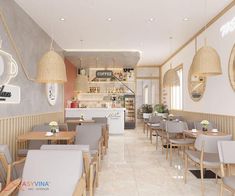 the interior of a restaurant with wooden tables and gray chairs, white walls and beige accents