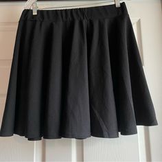 Nwot Never Worn Black Ruffled Skirt With Elastic Waist. No Size Listed But Estimated Large To Xl. Waist Measures 32” When Not Stretched. Comfy And Flouncy. Could Be Worn By Itself Or Over Leggings. Casual Black Skort With Full Skirt Shape, Casual Black Skort With Full Skirt, Casual Black Full Skirt Skort, Black Ruffled Skirt, Ruffled Skirt, Ruffle Skirt, Black Skirt, Wearing Black, Elastic Waist