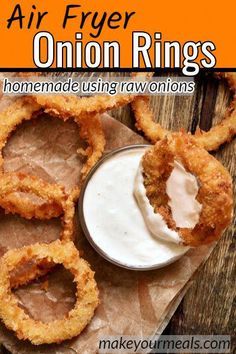 onion rings with ranch dip in the middle and text overlay reading air fryer onion rings homemade using raw onions