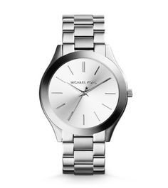 A perennial favorite, our iconic Runway watch gets a slim update just in time for the holidays. We love how the sleek, understated dial reads modern, and in silver-tone stainless steel, easily adds a gilded touch to your favorite looks. Stack it with an arm full of silver jewelry for your off-duty days, or slip it on as its own standout piece when you’re headed to the office. Michael Kors Runway, Slim Watches, Watches Women Michael Kors, Olivia Burton, Women Wrist Watch, Women's Watch, Watch Model, Stainless Steel Watch, Michael Kors Watch