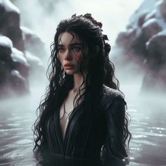 a woman in the water with long hair and wet clothes is looking at the camera