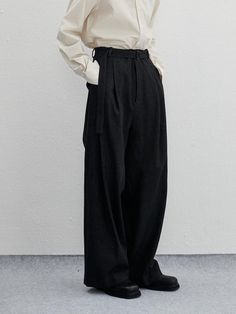 It is a casual wide fit denim pant. The pant has pleats on the front that makes perfect wide fit silhouette. Made of cotton denim fabric, the pant is stiff and comfy.- Side pockets- Back pockets- Pleats on the front- Wide fit Baggy Cotton Wide Leg Pants For Work, Oversized Wide Leg Pants For Workwear, Baggy Classic Wide Leg Workwear Pants, Classic Baggy Wide Leg Work Pants, Oversized Wide Leg Straight Pants For Work, Classic Wide Leg Straight Pants, Classic Baggy Wide Leg Pants For Work, Classic Baggy Wide Leg Pants, Classic Baggy Wide Leg Bottoms