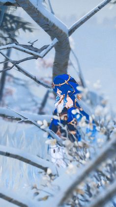 a snow covered tree with a blue and white costume on