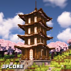 a tall wooden tower sitting on top of a lush green field