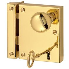 an image of a golden door handle and lock