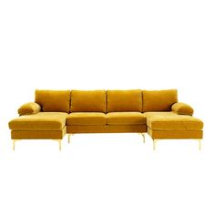 a yellow sectional sofa with chaise lounge and footstool in front of a white background