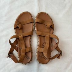 New Without Tags/ New Without Box! Zodiac Strappy Sandals Never Worn. Womens Size 9. Espadrille Bottom. Tan Suede Leather. Buckle Closure. Casual Brown Sandals With Adjustable Strap, Adjustable Brown Sandals For Outings, Tan Suede, Leather Buckle, Strappy Sandals, Tan Brown, Women's Shoes Sandals, Suede Leather, Shoes Sandals