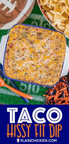 an image of taco fiesta dip in a casserole dish with chips on the side